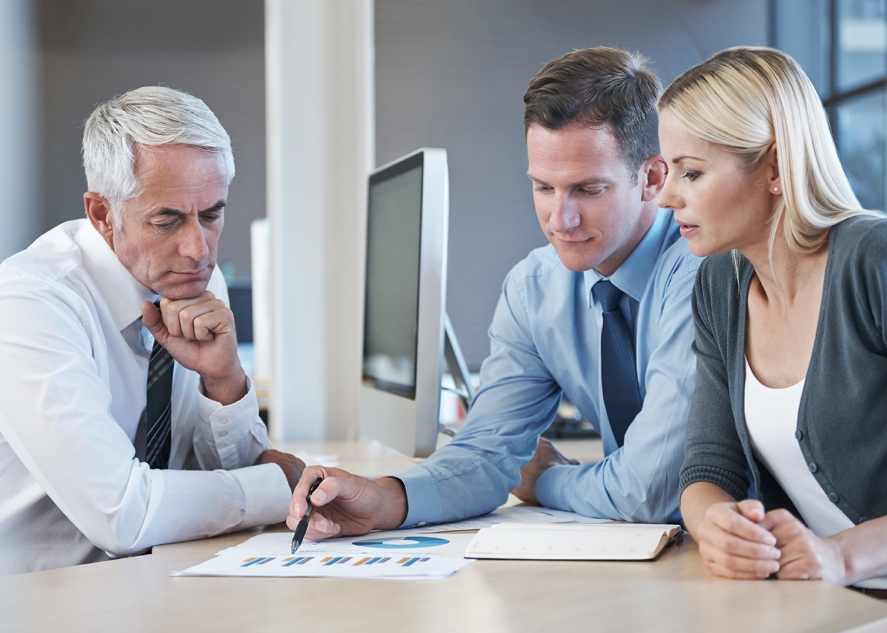 Couple meeting with Financial Advisor